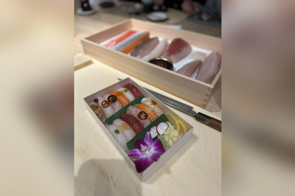 Assorted nigiri omakase box with fresh sliced fish